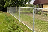 Забор из сетки-рабицы, круглые столбы 40мм, длиной 2,3м, сверху и снизу трос, монтаж под забивку